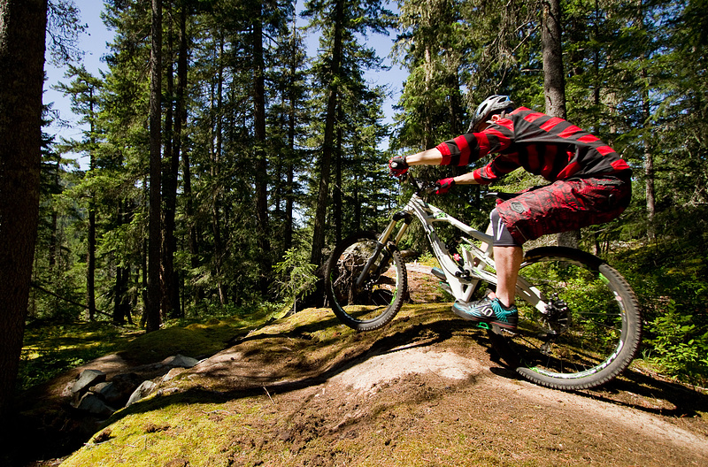 Earning your turns is part of mountain biking in my mind, but it's important to have a bike that not only lets you get to the top without feeling as if you are being punished for your heathen ways, but is also fully capable of letting you enjoy the rewards of such work. There is always a fine line with these 150 mm travel bikes. A bit too much attitude and they quickly become more of a tailgate ornament than something I'd want to climb on, but too much in the other direction can result in a noodle of a bike that deserves to be shod with barends and a saddle bag. The Marin Attack 6.9 surprised me in this regard, considering that at well over the 30 lb mark it managed to hold its own when climbing. Equipped with sturdy wheels and rubber, as well as Truvativ's hefty HammerSchmidt crankset, the white bike was never going to feel overly inspired on the uphills, but it certainly surprised me. Contrary to reviews of the bike that I've read elsewhere, it pedaled very well, even with the pedal assist on the RockShox Monarch 4.2 damper wide open. Seated spinning moves the bike along quite quickly, but unlike most other bikes with this amount of travel, standing up and hammering away upsets the suspension very little. Sloppy sprints at the end of the ride do not encourage the Marin to enter its travel any further than needed and the bike felt relatively spritely given its sturdy build. The obvious knock against its more than tolerable climbing ability would be the riding position that the stock components put you in. It should also be noted that the stock 66 degree head angle is far from ideal as well and can be a handful on the steepest of pitches, especially considering that the Lyric fork doesn't offer any way of shortening its long axle to crown height. Despite the weight and slack head angle, the Attack Trail climbed very well. In fact, I can think of more than a few lighter bikes that are supposed to pedal quite well that I'd pick AFTER the sturdy Marin if I had a big day of ascending planned. I can't be much more clear than that.