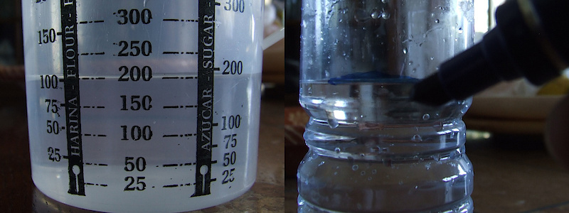 <span style='font-size:20px'>Step 16.</span> Measure out exactly 200ml of 5W damping oil. It is imperative to not use too much - this will cause hydraulic lock and prevent full travel, or too little - you'll have inconsistent damping.