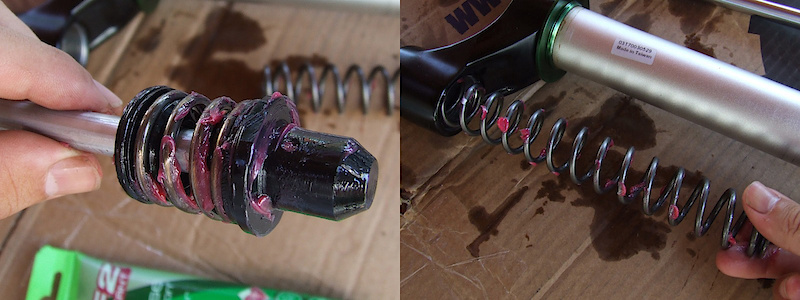 <span style='font-size:20px'>Step 11.</span> Grease both the negative and main spring. Insert the rod into the left stanchion with the negative spring up, then drop in main spring.