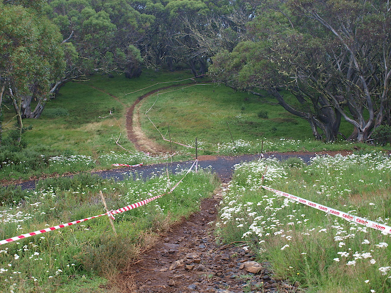 The course turns straight down the hill and riders pick up speed quickly, the right hand corner at the bottom of the shot is a prime candidate for foot out drift.