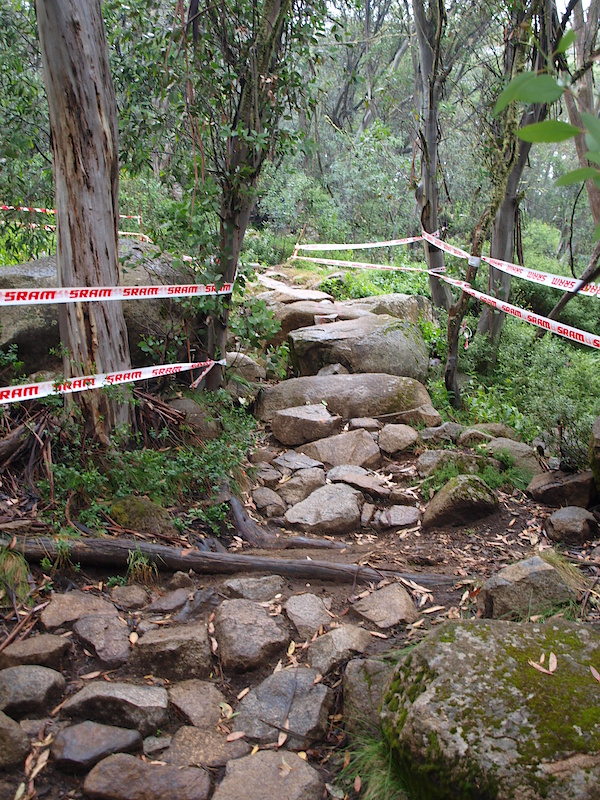 This is one of the most technical features on the track, a series of large boulders with a tight left hand corner at the base. This photo is looking up from the base.