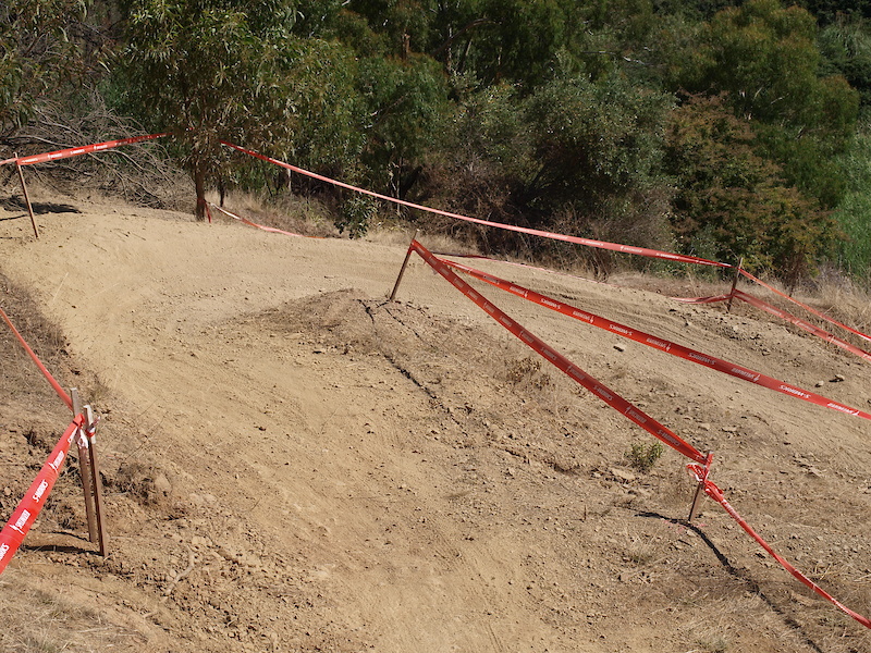 The track then ducks and weaves along through a series of switchbacks and bermed corners.