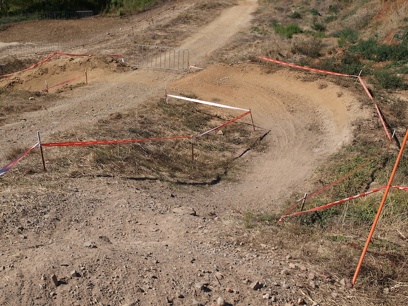 Only a few corners to go before the finish, here you can either cut in tight or ride around the berm to the right.