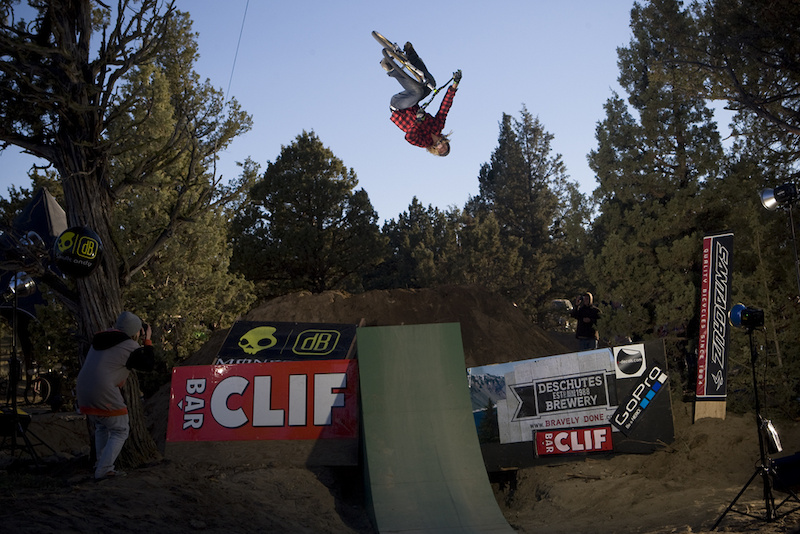 Kelly Mcgarry puts down a nice flip table while the satellite dishes and media peeps lurk in the trees