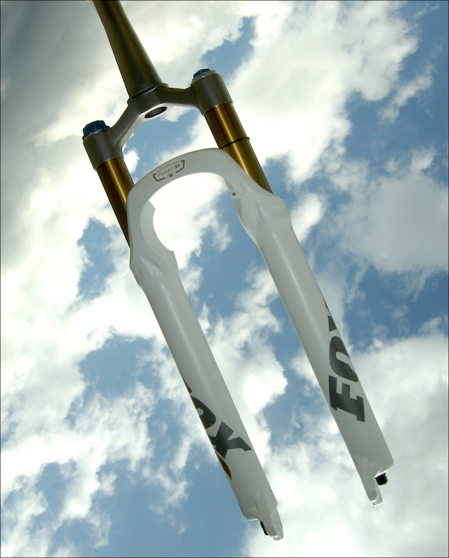 <span style='font-size:18px'>Fox 32 Float Ti Fork Specifications </span><br><br>-Purpose: Pro XC racing<br>-Travel: 80, 100, 120 mm<br>-Damper options: RLC FIT, Terralogic FIT, Remote RLC FIT<br>-Features: Magnesium Sliders, Kashima coated 32 mm aluminum stanchion tubes, SKF seals, One-piece titanium steerer and crown<br>-1.5-inch tapered steerer only<br>-Post type brake-caliper mounts<br>-15QR through-axle or 9mm slotted axle options<br>-Weight: 1300 grams (2.866 pounds) in RLC configuration.<br>-Price: $2140/1310 USD<br>