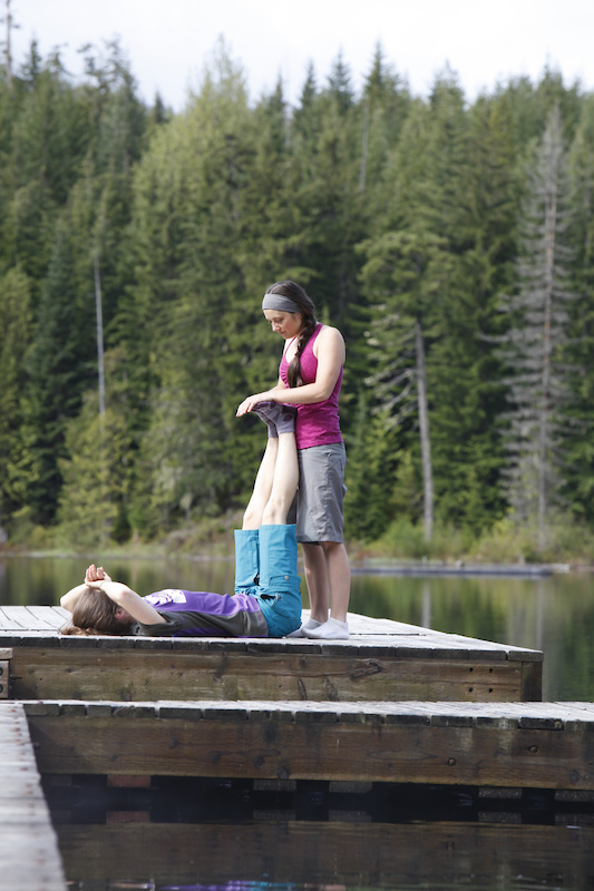 Relax your lower back all the way to your toes. Get your friend to push your toes down like this. If you are a girl like me then your feet smell like roses and are never sweaty.