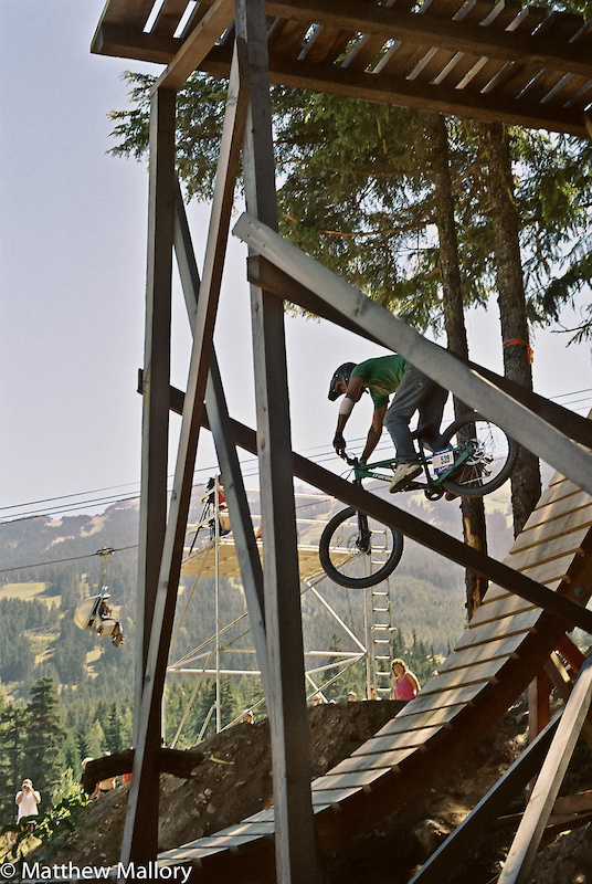 A rider drops off the wood in the 2006 slopestyle event