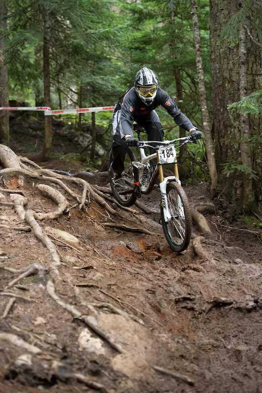 Suspension engineer for Trek, Eli Krahenbuhl. I kind of doubt the guts of those forks are stock, and his frame is made of carbon