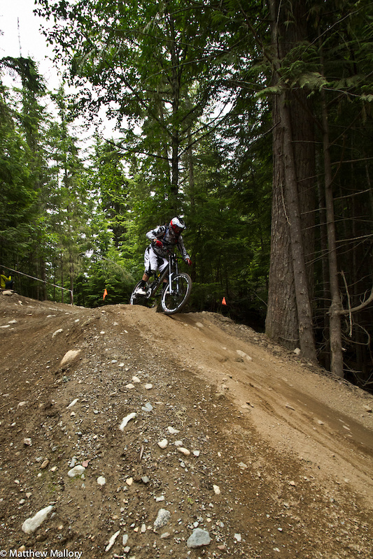 Riding with Bobby is an eye opening experience. For a blind guy he is fast! Here he is going into the step-down on Heart of Darkness.