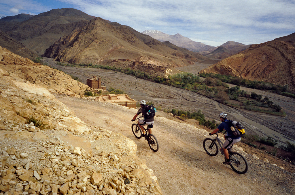 <span style='font-size:12px'>Our climb up from Toundoute started easy, surrounded by mind blowing scenery. Three hours later it had toughened up to the extent that the scenery had become a sweat-filtered blur.</span><br><br>We spin into the village of Telouet and pull up at the gite d'etape in darkness. It has been a surreal start to our seven day ride, pedaling onwards into the night with nothing but wilderness ahead. We're left buzzing from the experience as we chew local almonds and sip