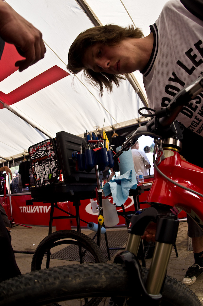 Precision and attention to detail gets Semenuk to the top. He was back in the park on the Sunday after winning Crankworx, practicing and training to win again. Most people would star fish and nurse the hang over but not this one. Here, he takes a couple of seconds to work with Shawn on set up.