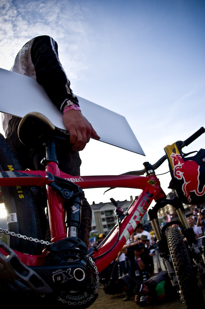 Just part of the job... Managing your big check, helmet and a fat bottle of Champagne.