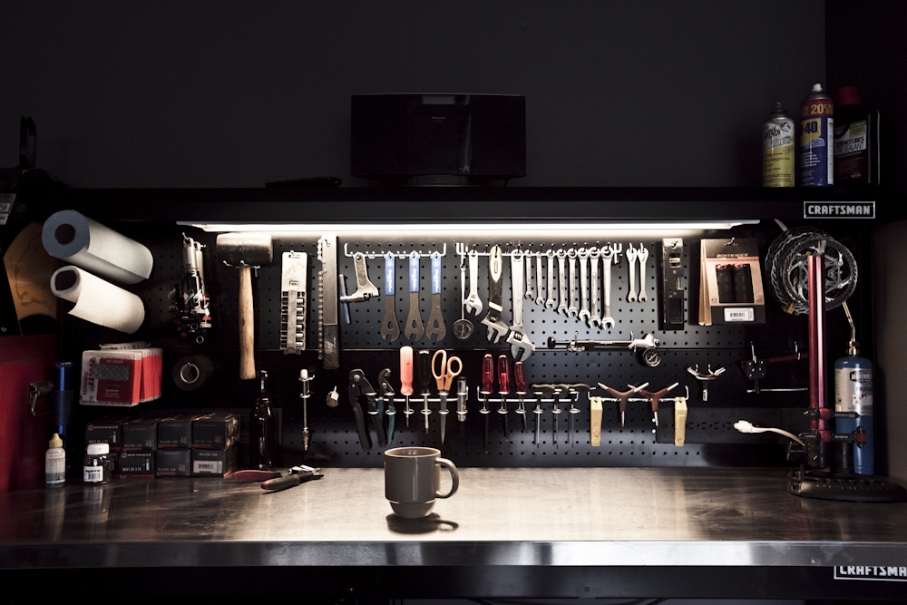 Everything has its place. Ross keeps his bench together neat and tidy and ready for any project. Some might say he's has too much time, but it's the precision, hard work and organization that got him to where he is. Imagine the travel and the training (beer drinking)? You need a tight ship!