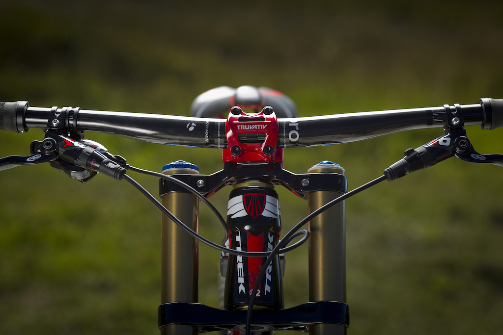 The 9.9's component spec consists of a mix of SRAM, Avid and Truvativ's new DH specific group, along with a some of Trek's in-house Bontrager parts sprinkled in. Some may be disappointed to see the Bontrager branded post, bar, tires and rims, but it needs to be noted that Trek has spared no expense when it comes to the bike's suspension. The custom tuned rear shock is the only production damper that makes use of a one way check valve on the main piston, something proven to be beneficial on dirt bikes to control chassis movement, and the Trek only fork is sprung with a combination of air and a lightweight titanium coil spring to keep the weight low and adjustability high. Both units receive the full Kashima treatment as well.